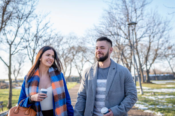 istock Young couple in a park 1365202593