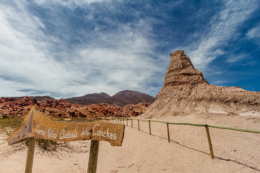 Sign in front of the Obelisk formation in the Quebrada de las Conchas, Salta, Argentina