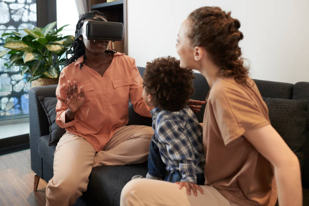 istock Famly Playing with VR Glasses 1365206618
