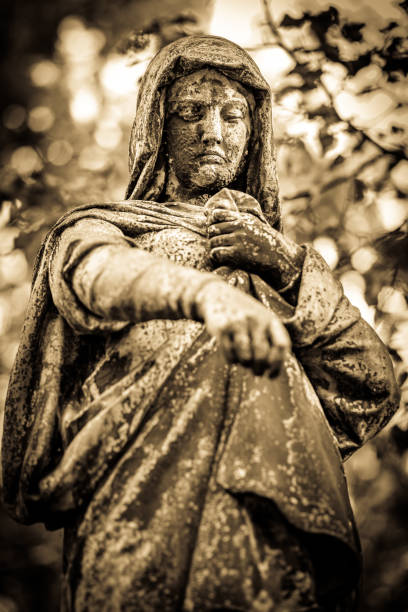 istock beautiful historic relief at a cemetery 1365207229
