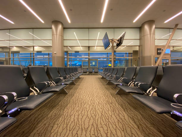 istock Rows of empty chairs at the airport 1365207521