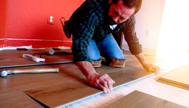 istock Installing wooden vinyl floor 1365209341