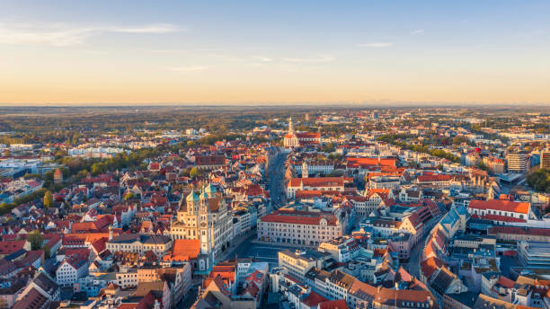 Augsburg city center City center of Augsburg. View from a height of the morning city. Mountains are visible in the background. augsburg stock pictures, royalty-free photos & images