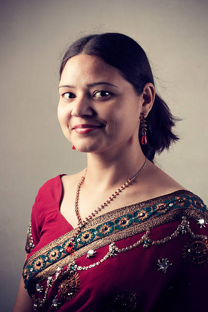 istock Beautiful Indian woman in red sari 136522113