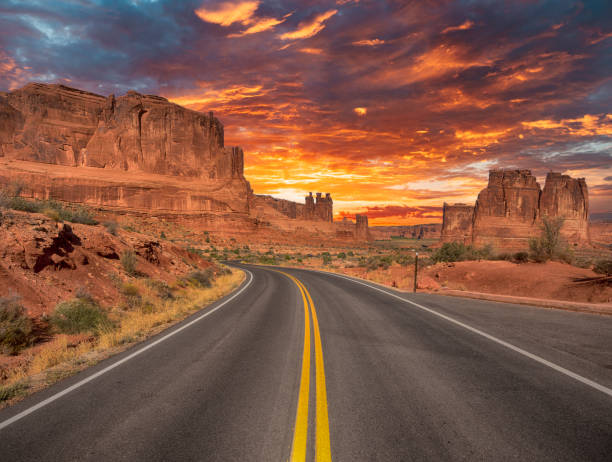 istock Arizona roadway at sunset 1365221644
