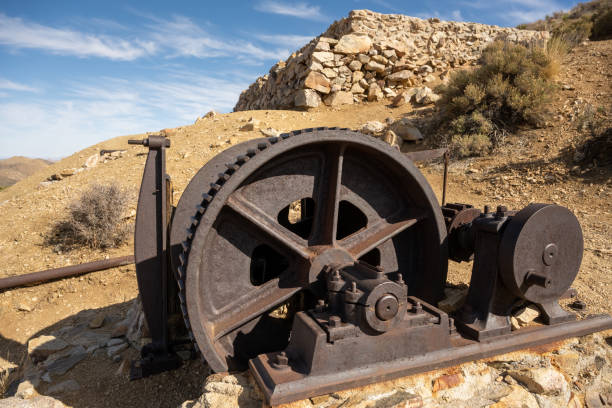 istock Old Equipment Stands At An Abandonded Mine 1365221730