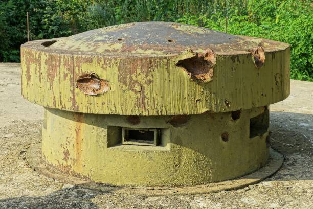 istock big old military green rusty iron tower with embrasures on a gray concrete pillbox 1365222687