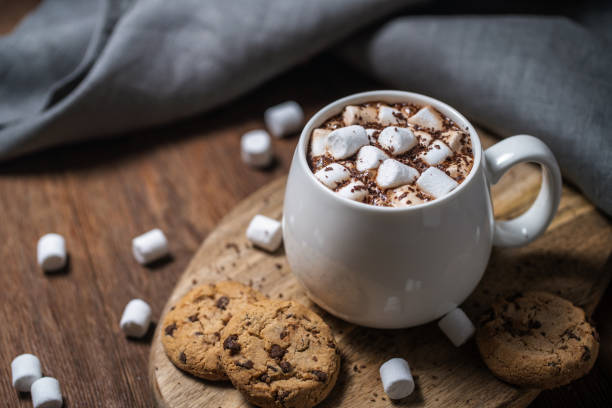 istock Mug of a fragrant hot chocolate with marshmallows and cookies 1365222713