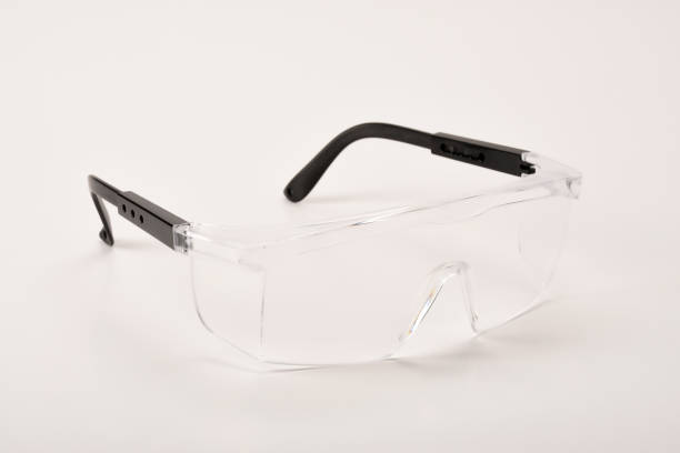 istock Protective eyewear safety glasses on the white background 1365222887