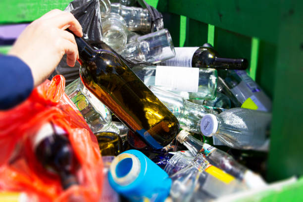 istock Glass jars and bottles collected for recycling. Environmental protection. 1365223037