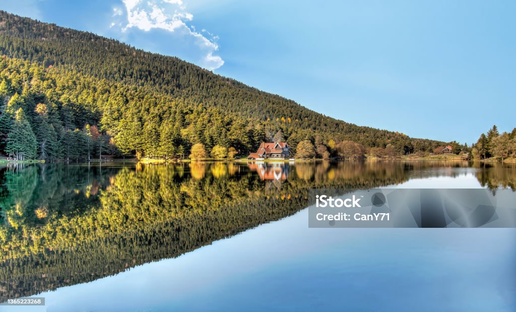 Panoramic view for Abant Lake From Bolu Turkey Panoramic view of Abant Lake with a wooden lake house in Abant, Golcuk, Bolu, Turkey Lake Abant Nature Park Stock Photo