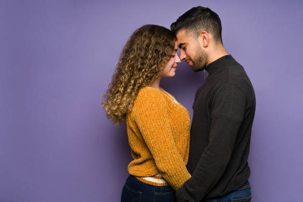 istock Happy couple in love having a tender moment 1365224486