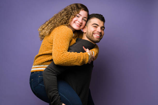 istock Attractive man enjoying a fun date with her girlfriend 1365224640