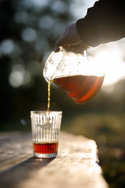 istock Close up shot pouring a cup of coffee 1365226201