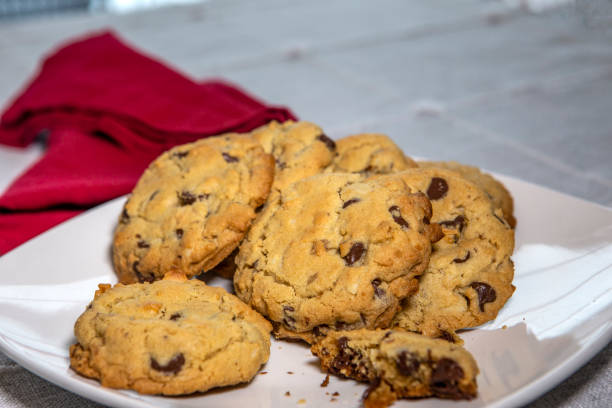 istock homemade chocolate chip cookies with macadamia nuts and coconut 1365227695