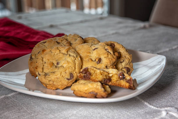 istock homemade chocolate chip cookies with macadamia nuts and coconut 1365227701