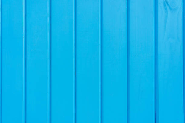 istock Rough textured painted wood surface of parallel vertical planks. Background or graphic resource 1365229412
