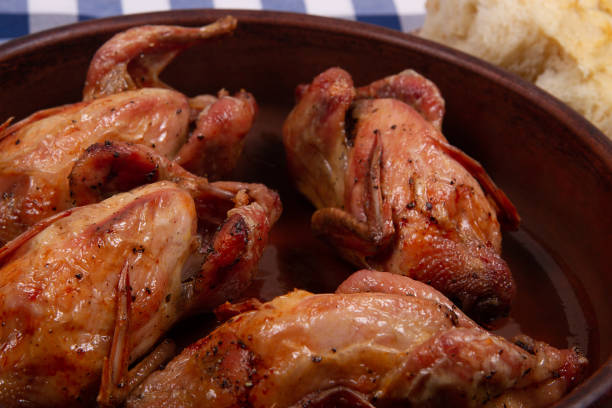 Roasted pigeon. Close-up.