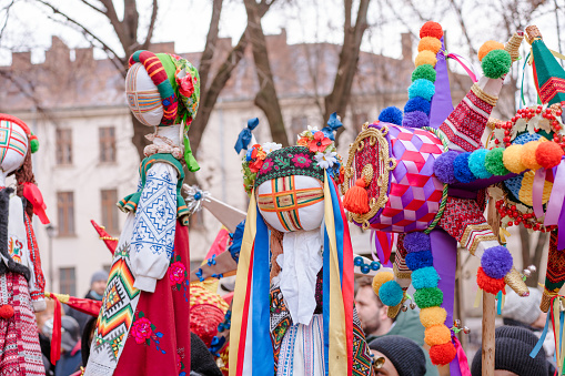 Lviv, Ukraine - January 8, 2022 : The flash of Christmas star festival, traditional festival of Christmas stars and motanka doll. Celebration of Orthodox Christmas in Lviv. Selective focus