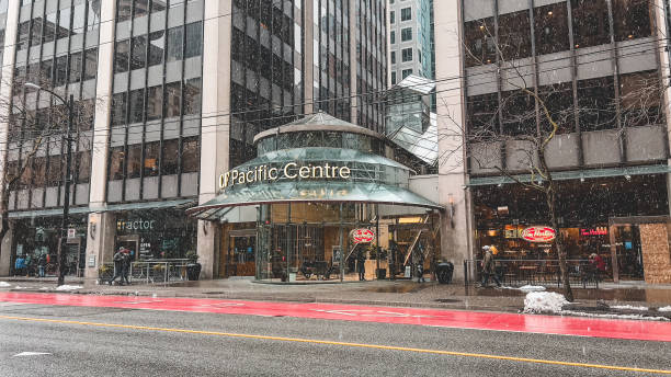 View of the Pacific Centre entrance during the snowfall stock photo