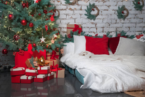 istock Bedroom is decorated for New Year. Interior details with Christmas decor.. 1365234796