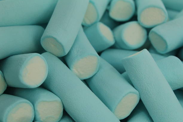 chewable marmalade blue sticks with white middle croup plan. dessert. Food day sweets.