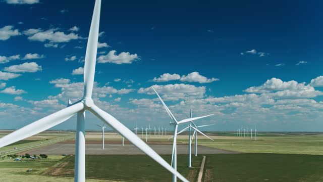 Line of Massive Wind Turbines in Rural Texas - Aerial