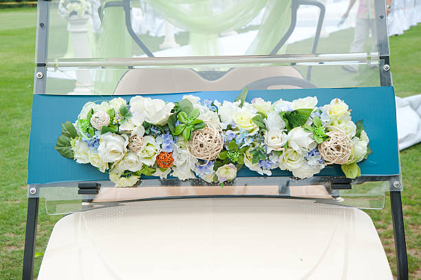 Decorated golf cart for an outdoor wedding stock photo