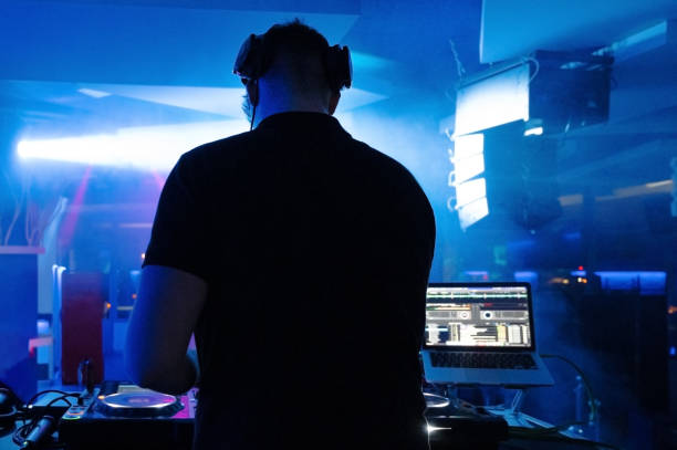 istock Deejay mixing at party. High quality photography. 1365242915