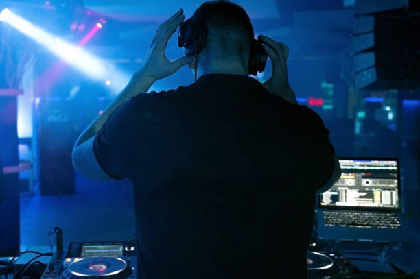 istock Deejay mixing at party. High quality photography. 1365242929