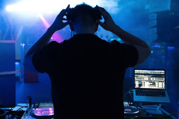 istock Deejay mixing at party. High quality photography. 1365242938