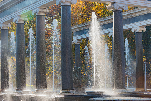 Petergof, Saint Petersburg, Russia - October 04, 2021: Fountain inside of the autumn park.