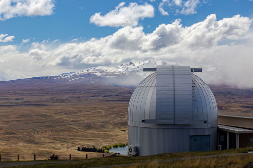 Frederick C. Gillett Gemini North telescope open for evening viewing just as stars begin to emerge in sky on the summit of Mauna Kea. Hawaii, USA.