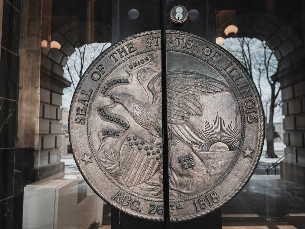 the state of illinois seal as door handles to the north entrance of the illinois state capitol building in springfield, illinois, usa - illinois imagens e fotografias de stock