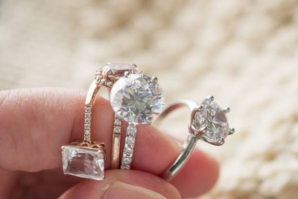 istock hand hold beautiful jewelry diamond ring 1365253456