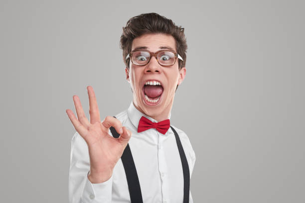 istock Excited male student gesturing OK 1365253826
