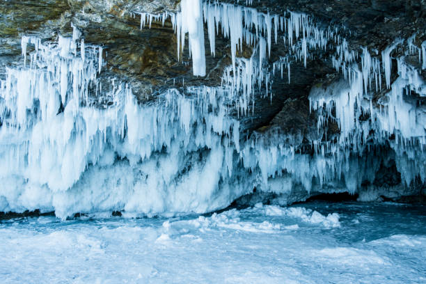 istock Icicles on the Lake Baikal in winter. 1365254346