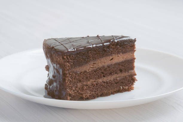 istock Chocolate cakeclose-up is on a white plate. 1365257468