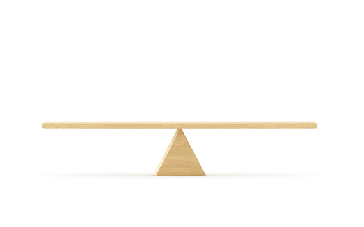 Wooden Seesaw Scale Sitting Balancing Front View on White Background stock photo