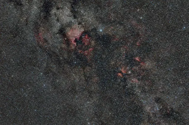 Wide field star constellation of swan with North America nebula or NGC 7000 with Deneb and emission nebulae at region of Sadr