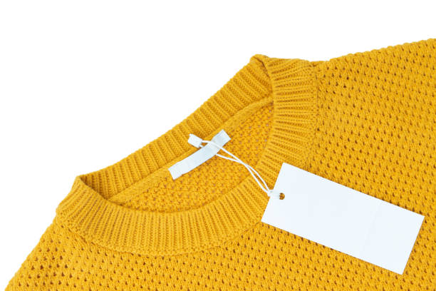 istock White blank rectangular clothing tag on yellow knitted sweater isolated on white background 1365258342
