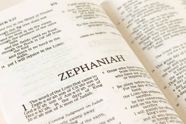 istock Zephaniah open Holy Bible Book close-up. Old Testament Scripture prophecy 1365259377