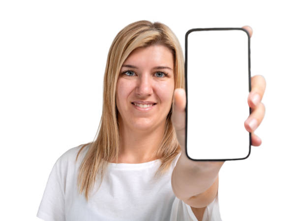 istock Young woman showing phone screen isolated 1365259456