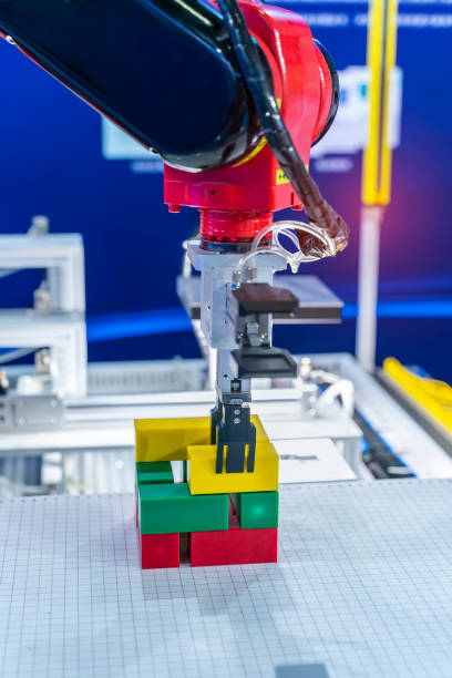 istock Automatic industrial robotic robot working, industry 4.0 and technology concept 1365259807