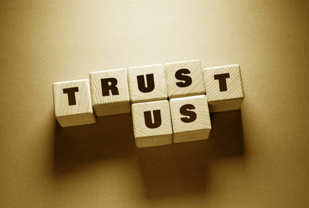 istock Trust Word with Wooden Cubes 1365262030