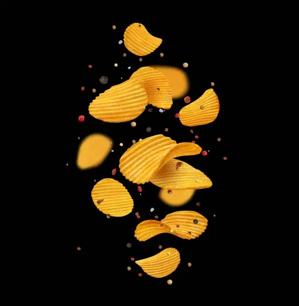 Vector illustration of Falling crispy ripple potato chips and spices