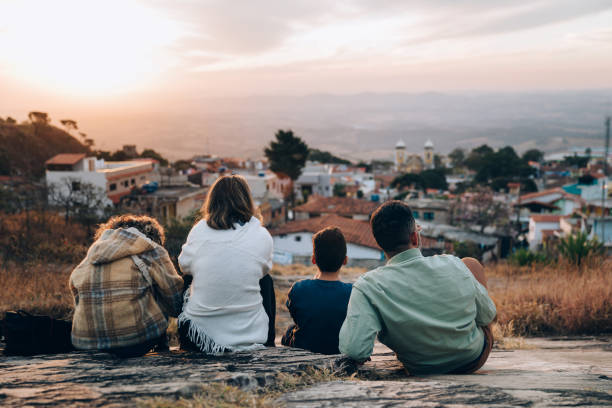 istock Family enjoying the sunset 1365264303