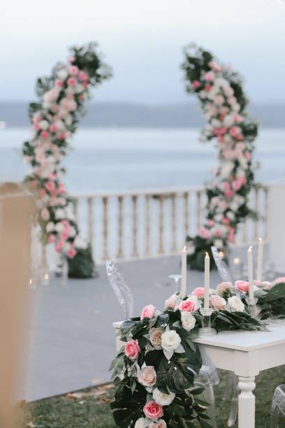 istock stage and decoration with green flowers on the table 1365264821