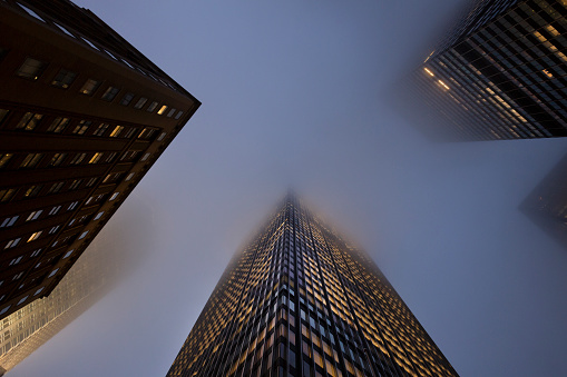 Fog covering the skyscrapers in midtown Manhattan.