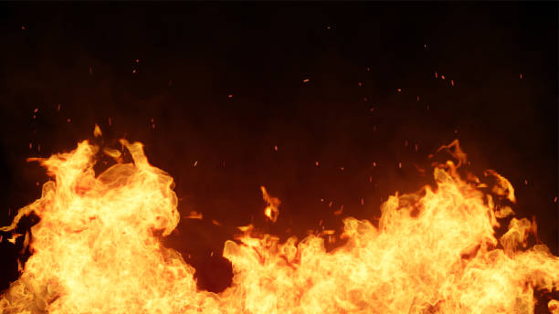 istock 3D fire and Burning embers glowing. Fire Glowing Particles on Black Background 1365271099